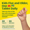 Hand holding a mini tablet, kids five and older, one mini tablet daily graphic