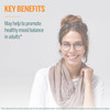 Smiling woman with glasses, Genestra key benefits graphic