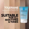 Moisturizer tube over skin tone swatches, suitable for all skin types