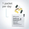 One Men's Vitality daily packet with four tablets and softgels