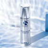 iS Clinical Moisturizing Complex bottle on a sunlit icy background