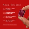 Hand holding a red chew with Memory + Focus Chews text