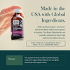 Hand holding elderberry syrup bottle, made in USA Austrian elderberry dosage graphic