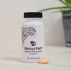 Methyl FMT bottle with a capsule on a table