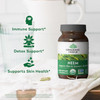 Organic India Neem bottle beside a sink with benefit icons