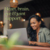 Woman with laptop, heart brain eye and joint support lifestyle graphic