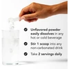 Scoop of powder over a glass of water with mixing directions
