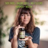 Woman holding the bottle, soy free, dairy free, no fillers, kosher and vegan graphic
