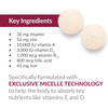 Two chewable tablets beside a key ingredients list