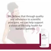 Smiling woman and Ultra Multi bottle with a brand quote