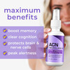 Woman holding an ACN spray bottle with benefits list
