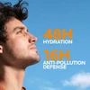 Man looking up at the sky with 48H hydration banner