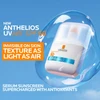 Anthelios UV Air bottle in a water bubble, texture as light as air banner