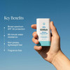 Hand holding the stick against blue sky, key benefits graphic