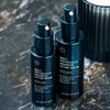 Two Multi Peptides GF Advanced Lifting Serum bottles on dark stone
