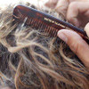 Hand combing wavy hair with Baxter tortoiseshell Large Comb