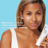 Woman applying Water Drench Sheer Tint under makeup lifestyle graphic