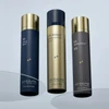 Three Skinbetter Science bottles on a reflective surface
