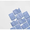 Resurface and Repair Peptide Pads pouches scattered on a gray surface
