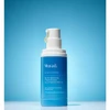 Murad Acne Control serum bottle on blue watery background