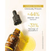 Serum Omega open bottle golden oil pool, clinically proven texture graphic