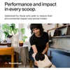 Woman at home with her dog, performance and impact in every scoop graphic