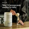 Scooping protein powder into a glass, take 1-2 scoops post workout or daily graphic