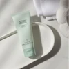 Jan Marini Antioxidant Daily Face Protectant tube on a white dish with towel