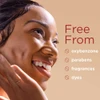Smiling model with EltaMD UV Clear free-from ingredient list graphic