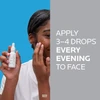 Woman holding Glycolic B5 Serum, apply 3-4 drops every evening to face text