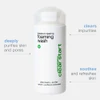 Foaming Wash bottle with callouts on pores, impurities and refreshed skin
