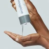 Dermalogica Special Cleansing Gel poured from bottle into palm