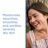 Smiling woman, moisturizes, nourishes and soothes severely dry skin text