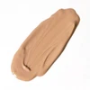 Revision Intellishade tinted moisturizer beige texture swatch