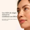 Woman in profile with Spanish text about naturally derived AHAs combined with BHA