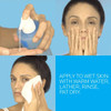 Model lathering and patting dry face with La Roche-Posay Toleriane cleanser steps