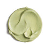 Swirl of pale green body cream