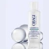 Obagi CLENZIderm cleanser bottle with clear spheres