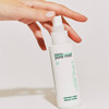 Hand pressing the Dermalogica Micro-Pore Mist spray