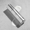 Smart Response Serum bottle lying beside a dollop of serum on gray