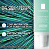 Pump bottle with naturally derived hyaluronic acid text on green leaves