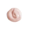 Pink lip serum texture swatch