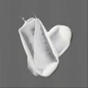 Swipes of white serum on a gray background