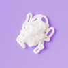 Swirl of white cream on purple