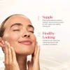 Smiling woman with eyes closed beside supple and healthy-looking text