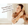 Woman brushing her curly hair, detangling spray for wavy and curly hair graphic