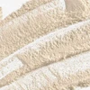 Close-up of fine cream-colored exfoliating powder