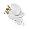 White lotion texture with sea salt and botanical bits