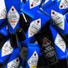 Pile of Jack Black lip balm tubes with a Nightmode tube