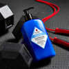 Jack Black Turbo Body Lotion bottle beside dumbbells and a jump rope